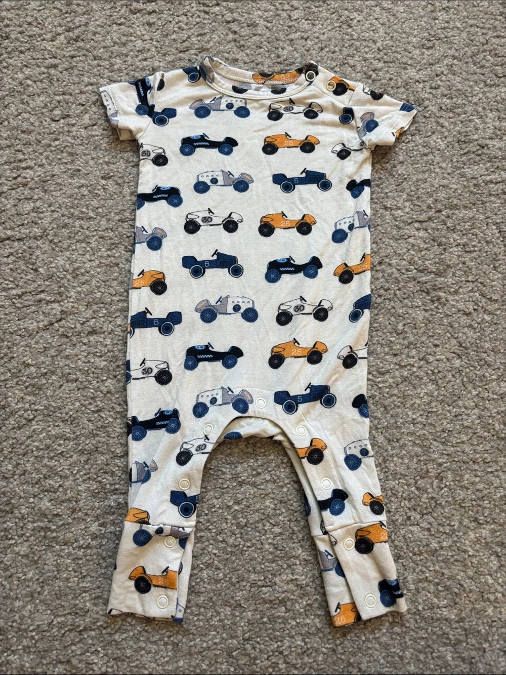 Posh Peanut Cream One-Piece with Navy and Orange Race Cars 0-3m